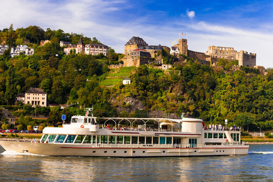 Romantic river cruises over Rhein with famous medieval castles. Germany