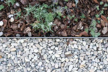 White pebbles pine bark garden decoration