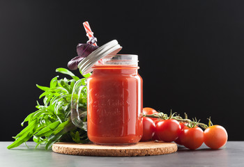 Tomato juice and fresh tomatoes