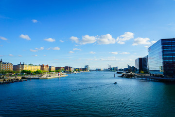 Copenhagen waterfront cityscape in Copenhagen, Denmark. Cityscape showing waterfront buildings.