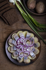 Salted herring with potatoes and onions