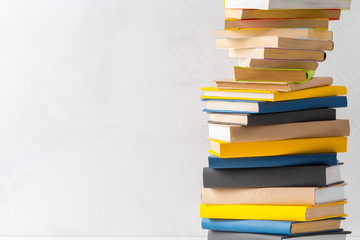  pile of paperback books on a table