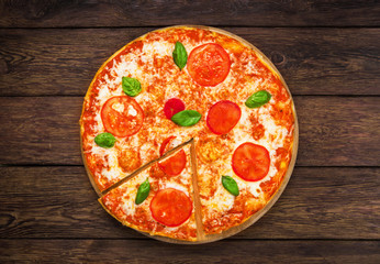 Delicious pizza with mozarella and tomatoes - Margherita