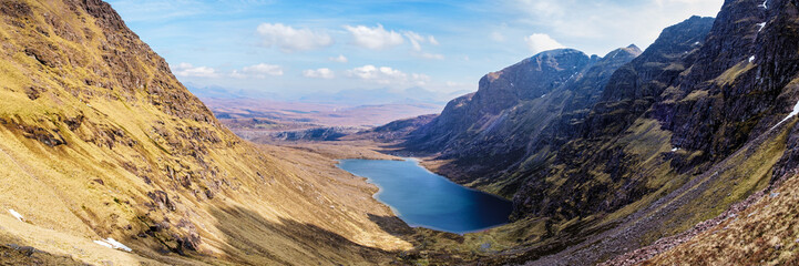 Panoramic view of Toll an Lochain corrie encircled by An Teallach and Corrag Buidhe. Highlands Of Scotland, UK