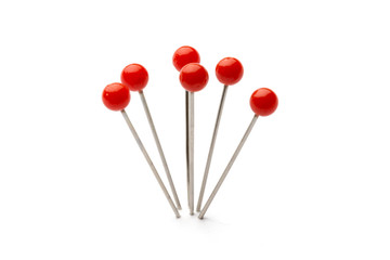 Push pins isolated on white background.