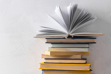  pile of paperback books on a table