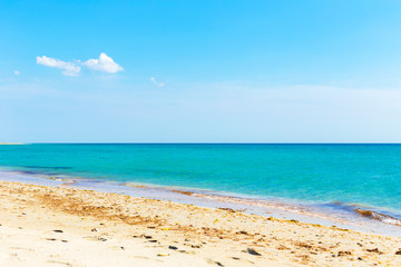 Tropical beach with sand, summer holiday background.