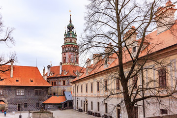 Obraz premium Panorama of old Cesky Krumlov castle in cloudy sky, Bohemia, Czech Republic. Cesky Krumlov is a UNESCO World Heritage Site since 1992.