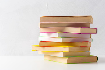  pile of paperback books on a table