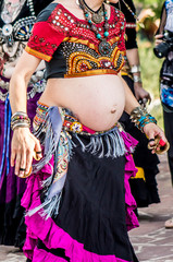 Pregnant woman in Indian costume