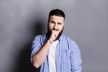 Fototapeta premium Portrait of yawning bearded man