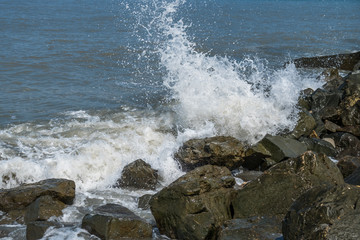 Waves on the coastal stones of the Black Sea, Poti, Georgia