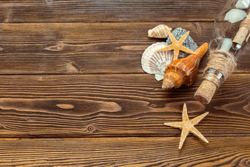 Beach accessories on wooden board