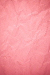 Fototapeta premium Crumpled recycle pink paper background.