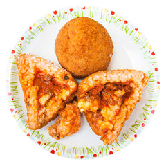top view of meat ragu stuffed rice balls arancini