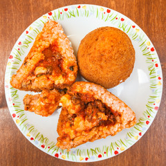 top view of meat ragu stuffed rice balls arancini