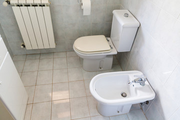indoor of typical white toilet room