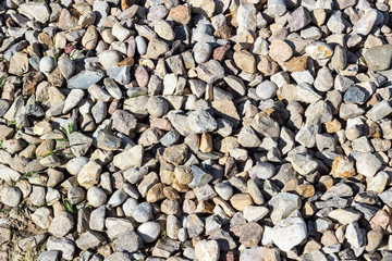 Background pattern, Crushed stone and small stones filled with sun