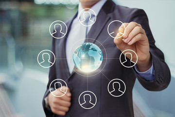 Businessman draws a profile of the candidates.