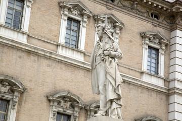 Fototapeta na wymiar Ducal Palace with Ciro Menotti Statue; Modena