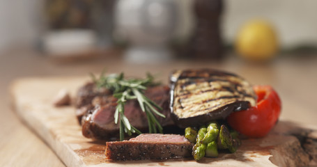 piece of rib eye steak with vegetables