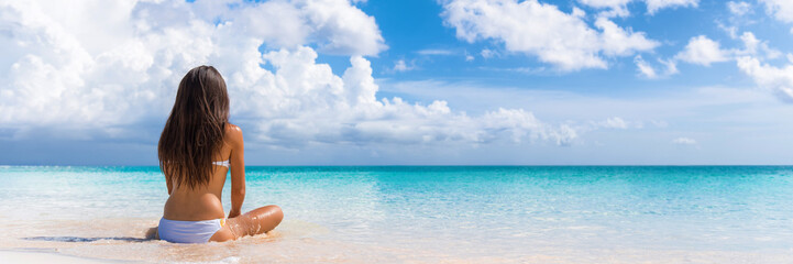 Beach luxury travel vacation woman relaxing banner. Panorama background summer spa retreat resort...