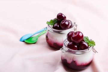 Traditional  Italian dessert panna cotta with fresh sweet cherry fruit