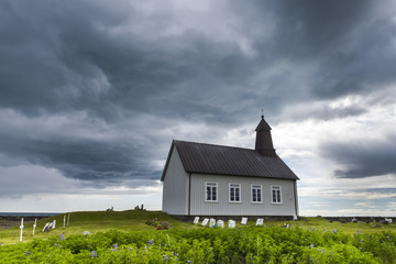 Strandkirkja on Iceland with Dark Clouds