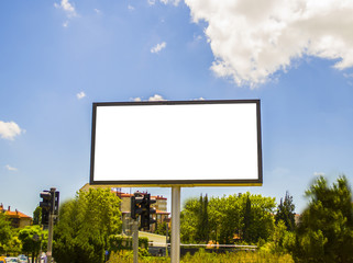 A white blank billboard with the view of the sky