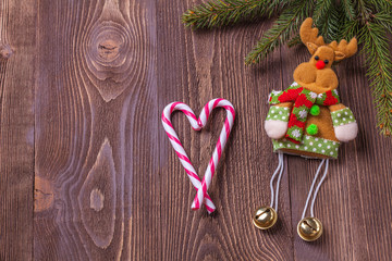 Christmas holidays composition on brown wooden background with copy space for your text