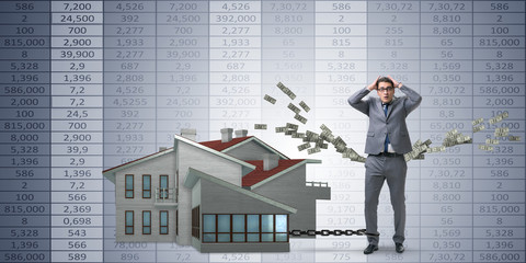 Businessman in mortgage debt financing concept