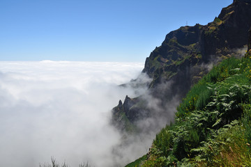 Madeira mountains in clouds.