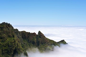 Madeira mountains in clouds.