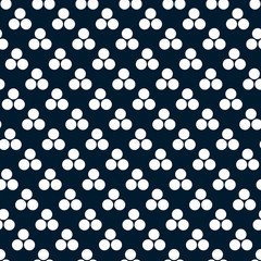 Seamless white geometric pattern on dark blue background.