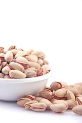 Pistachios in white bowl