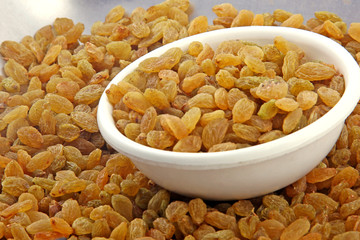 Raisin In White Bowl on White background