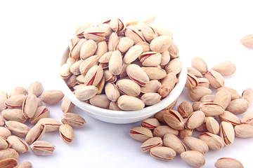 Pistachios in white bowl