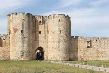 Fototapeta na wymiar Historic towers and ramparts in the city of Aigues-Mortes, France 