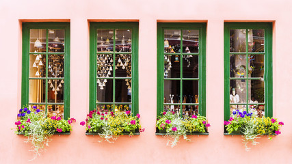 Facade of a house with flowers in Riga