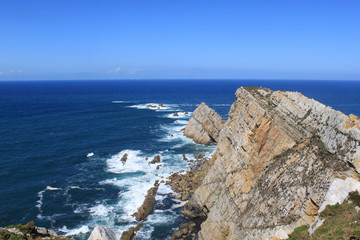 cliff near the Atlantic ocean with a blue sky, Spain