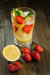 Lemonade with lemon and strawberry, mint and ice