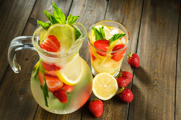 Lemonade with lemon and strawberry, mint and ice