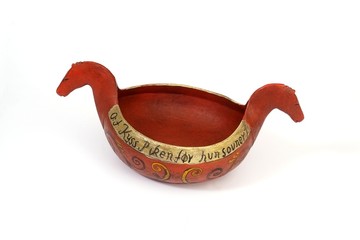 Souvenir in the form of antique beer cup. Norwegian text means "To drink beer until it is sour, kiss the girl, until she fell asleep" in English