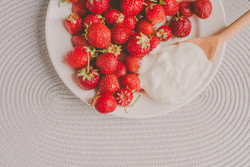 Bunch of bananas and strawberries. Photo toned style Instagram filters. Concept of healthy breakfast. Flatlay