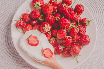 Bunch of bananas and strawberries. Photo toned style Instagram filters. Concept of healthy breakfast. Flatlay