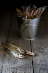 Still life with fish on a wooden table, rustic