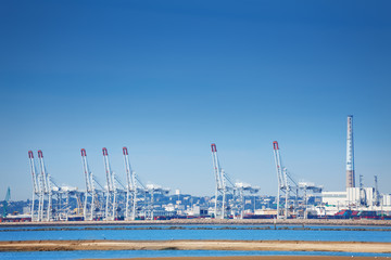 Port of Le Havre with portal cranes at sunny day
