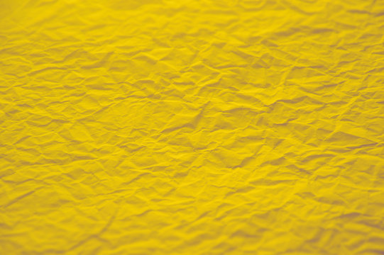 Premium Photo  Crumpled yellow paper background texture