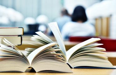 Books lying on the table in the public library