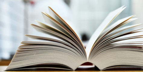 Books lying on the table in the public library